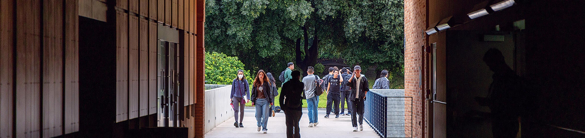 Students walking through breezeway on campus