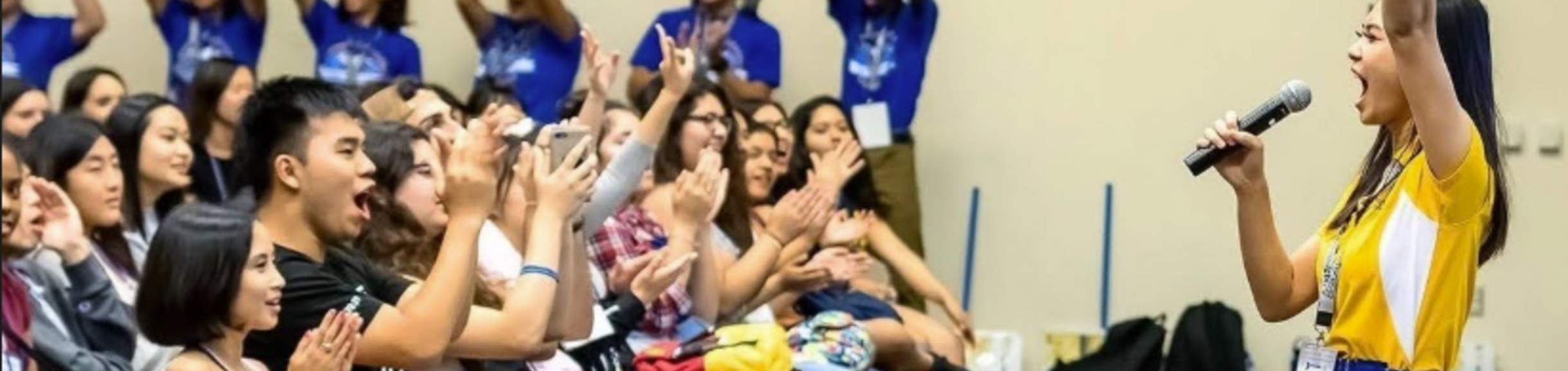 Students cheering at Highlander Orientation closing ceremony